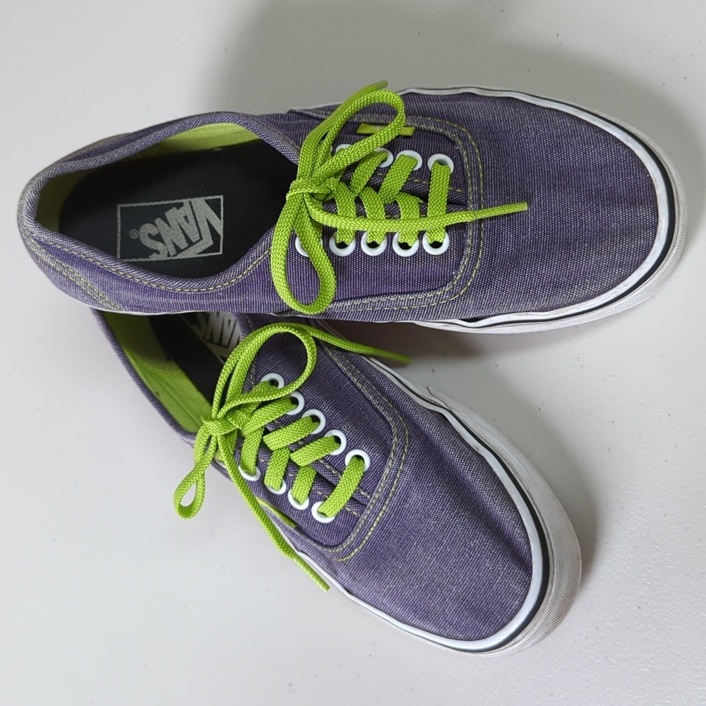 Vans, denim color with lime green trim and laces. Sz.8.5